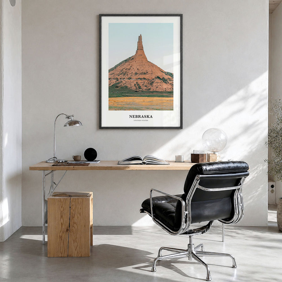 Nebraska Classic Poster in a black wood frame, hanging in a bright home office