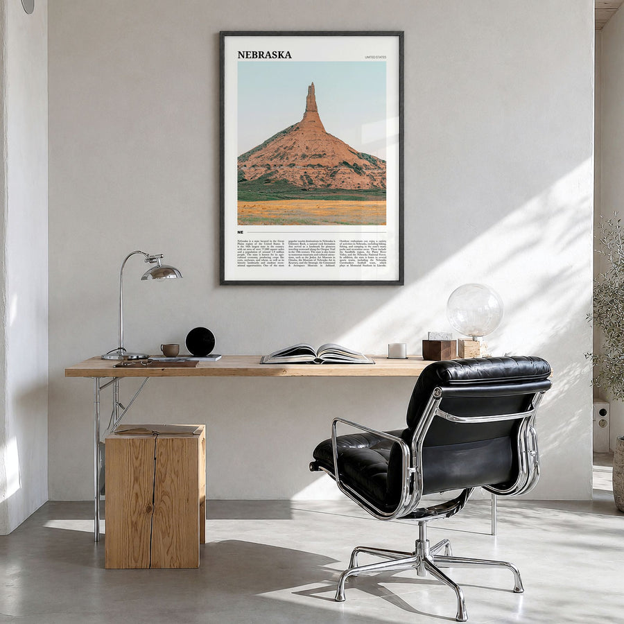 Nebraska Travel No 1 Poster in a black wood frame, hanging in a bright home office