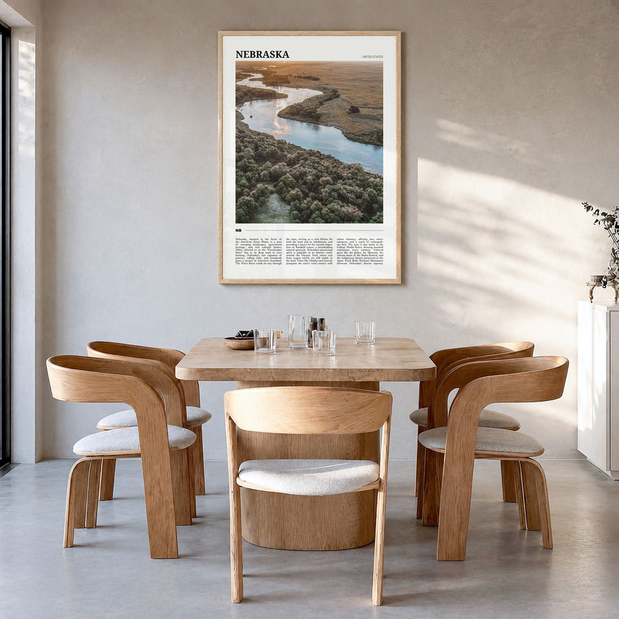 Nebraska Travel No 2 Poster in a natural wood frame, hanging in a dining room