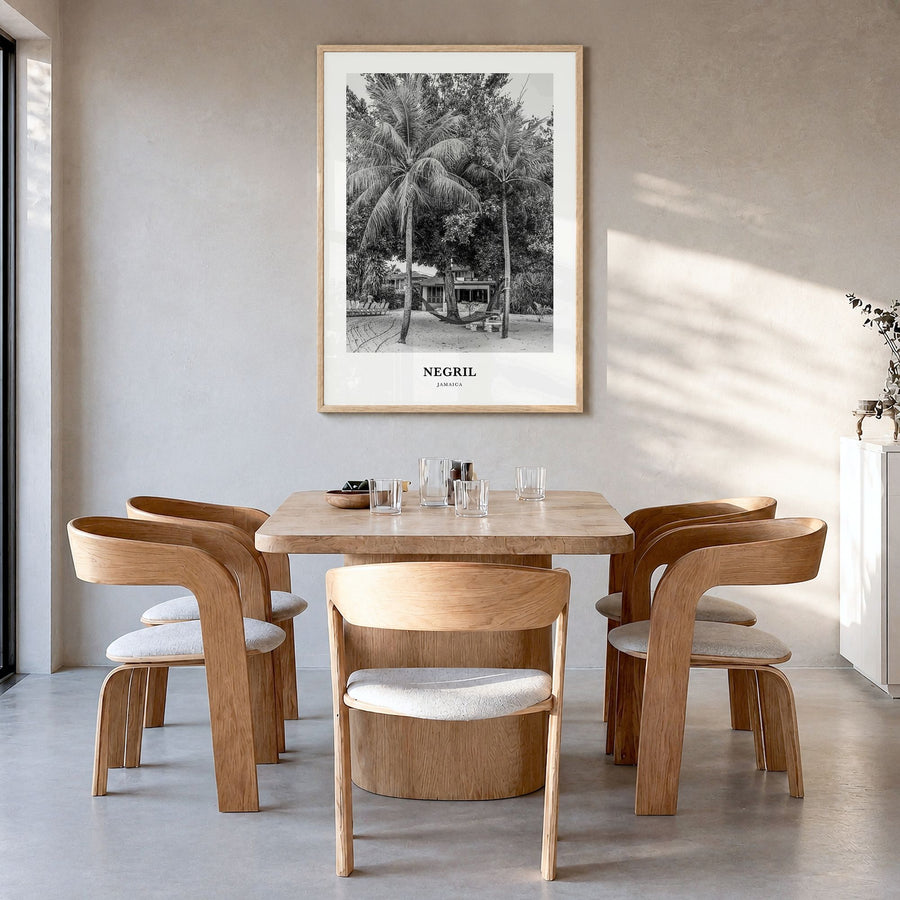 Negril Classic Poster in a natural wood frame, hanging in a dining room