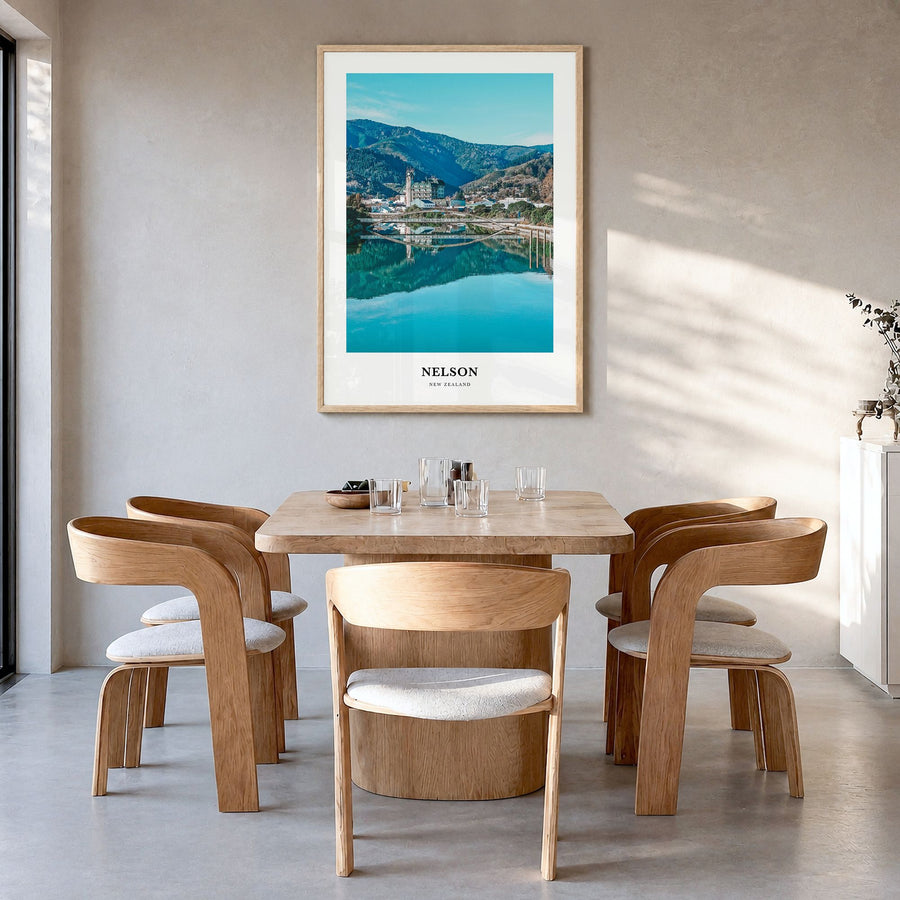 Nelson Classic Poster in a natural wood frame, hanging in a dining room