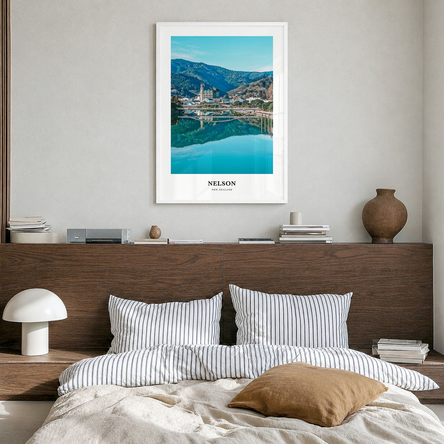 Nelson Classic Poster in a white wood frame, hanging in a bedroom