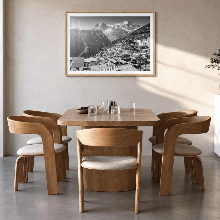 Nepal Photo Poster in a natural wood frame, hanging in a dining room, white border