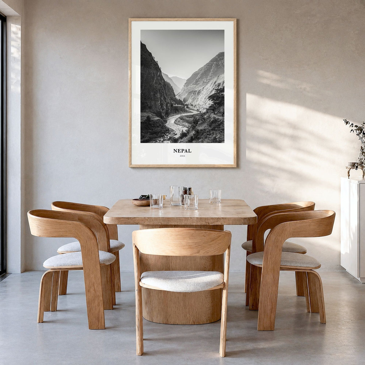 Nepal Classic No 1 Poster in a natural wood frame, hanging in a dining room