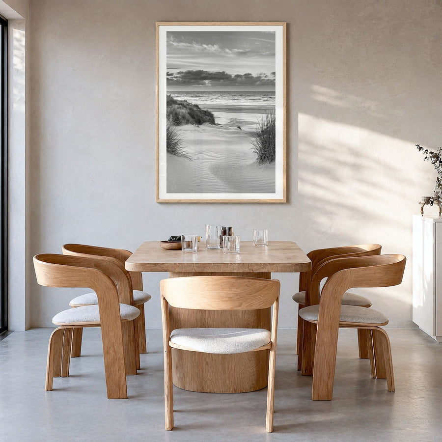 Netherlands Photo Poster in a natural wood frame, hanging in a dining room, white border