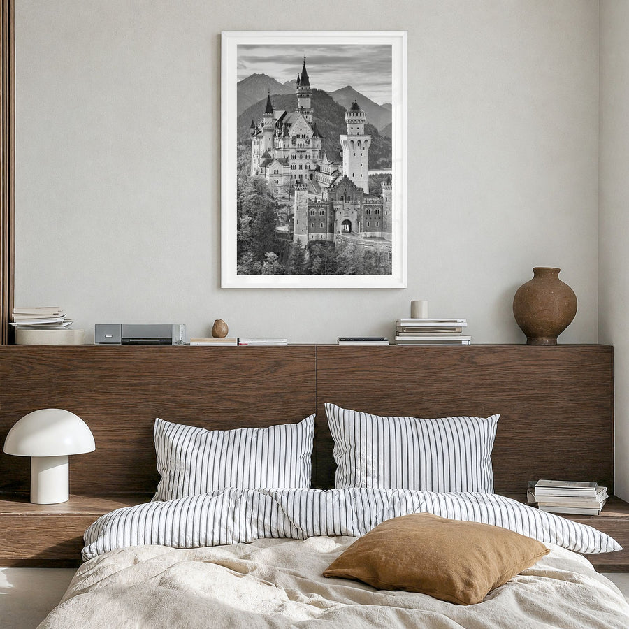 Neuschwanstein Castle Photo Poster in a white wood frame, hanging in a bedroom, white border