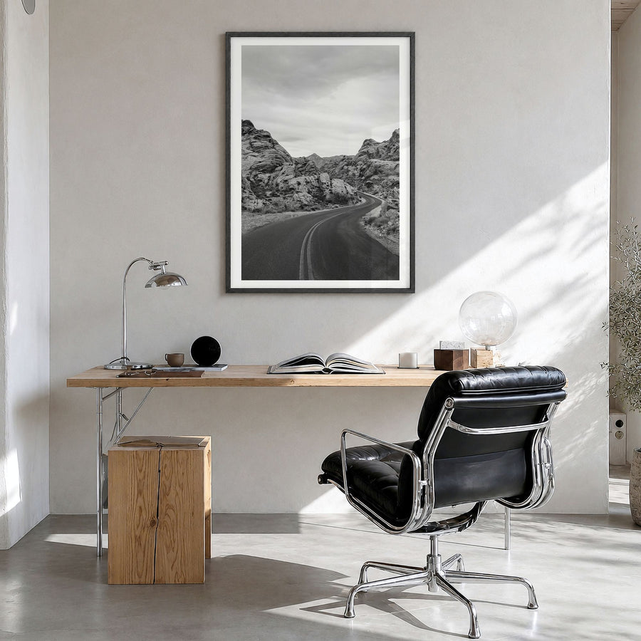 Nevada Photo Poster in a black wood frame, hanging in a bright home office, white border
