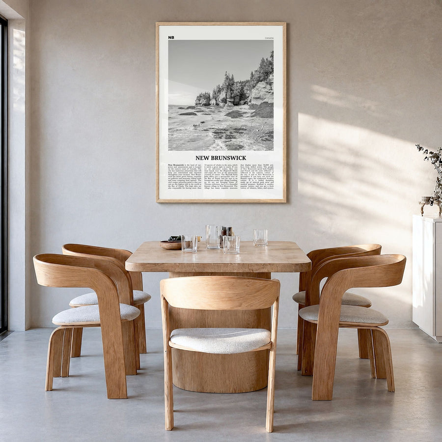New Brunswick Newspaper Poster in a natural wood frame, hanging in a dining room