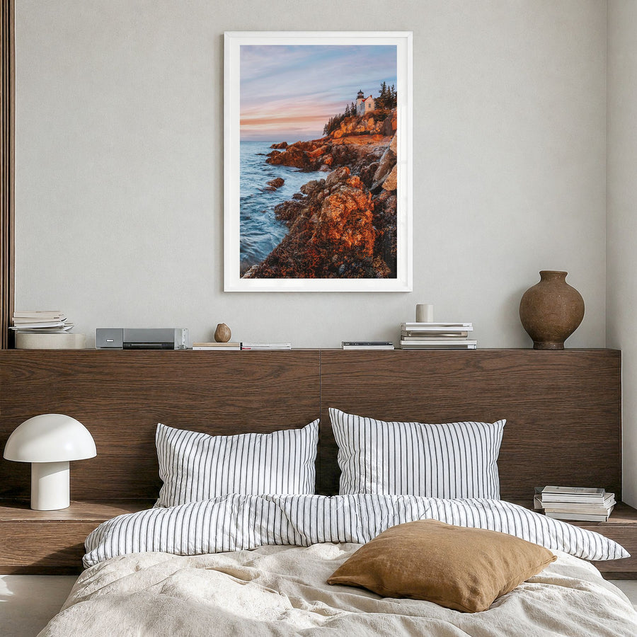 New England Photo Poster in a white wood frame, hanging in a bedroom, white border