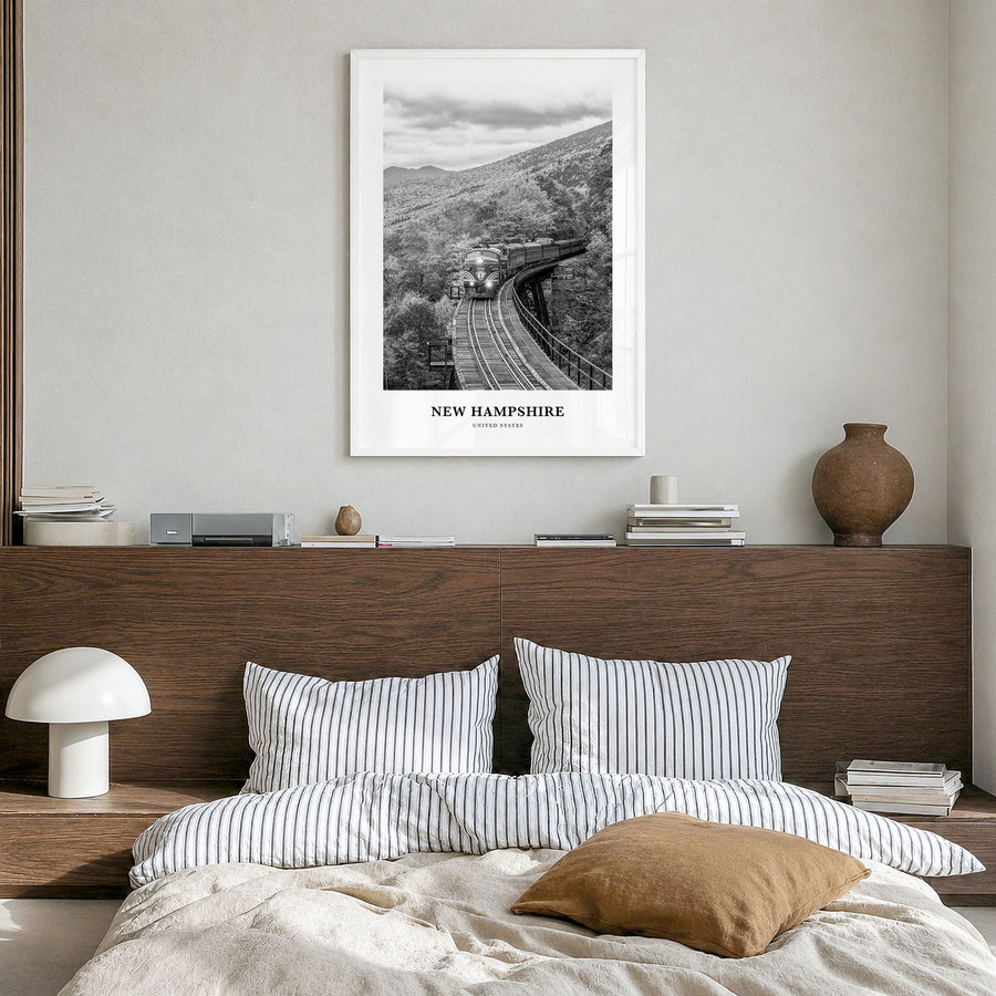 New Hampshire Classic Poster in a white wood frame, hanging in a bedroom