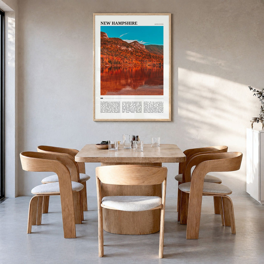 New Hampshire Travel No 1 Poster in a natural wood frame, hanging in a dining room