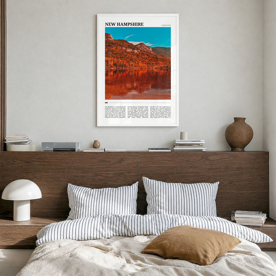 New Hampshire Travel No 1 Poster in a white wood frame, hanging in a bedroom