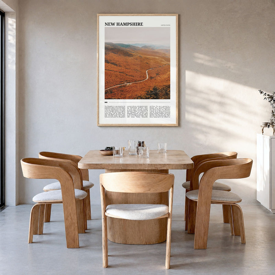 New Hampshire Travel No 3 Poster in a natural wood frame, hanging in a dining room