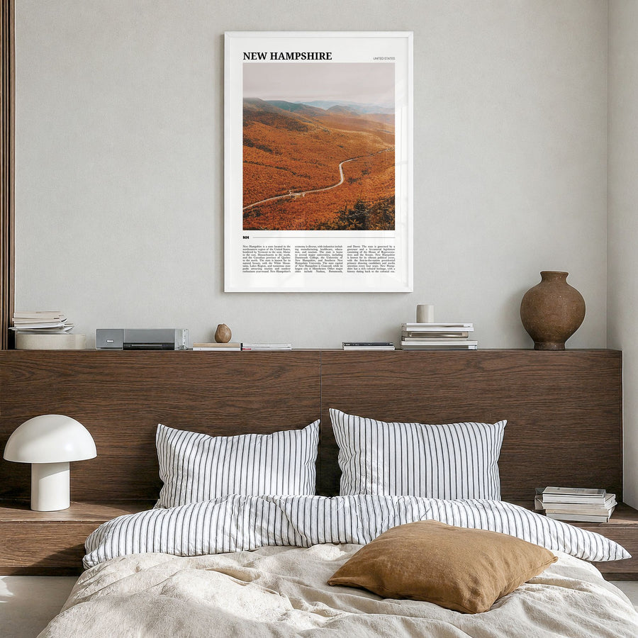 New Hampshire Travel No 3 Poster in a white wood frame, hanging in a bedroom