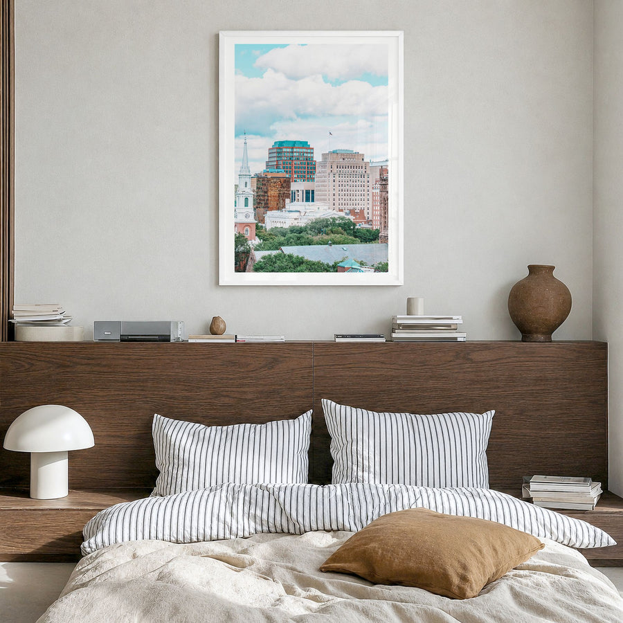 New Haven Photo Poster in a white wood frame, hanging in a bedroom, white border