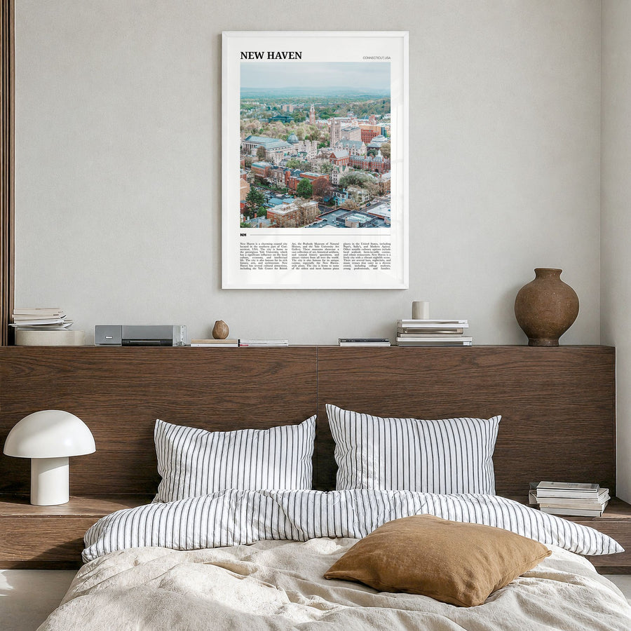 New Haven Travel Poster in a white wood frame, hanging in a bedroom