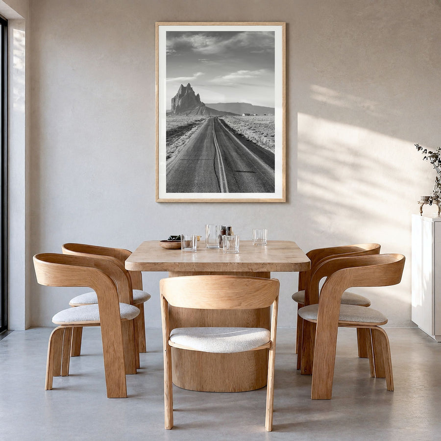 New Mexico Photo Poster in a natural wood frame, hanging in a dining room, white border