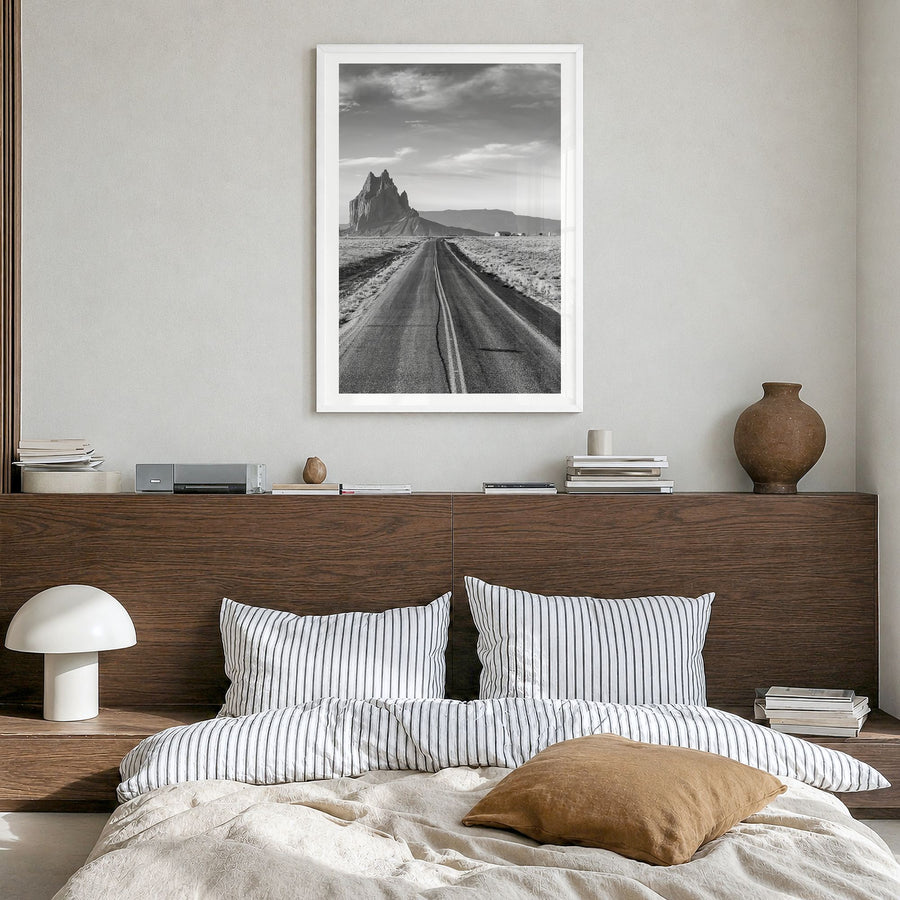 New Mexico Photo Poster in a white wood frame, hanging in a bedroom, white border