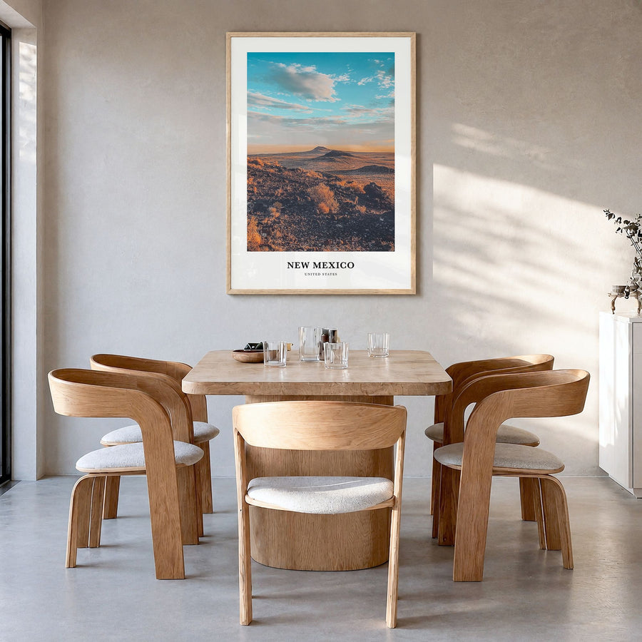 New Mexico Classic Poster in a natural wood frame, hanging in a dining room