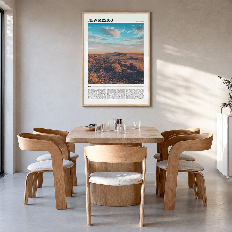 New Mexico Travel Poster in a natural wood frame, hanging in a dining room