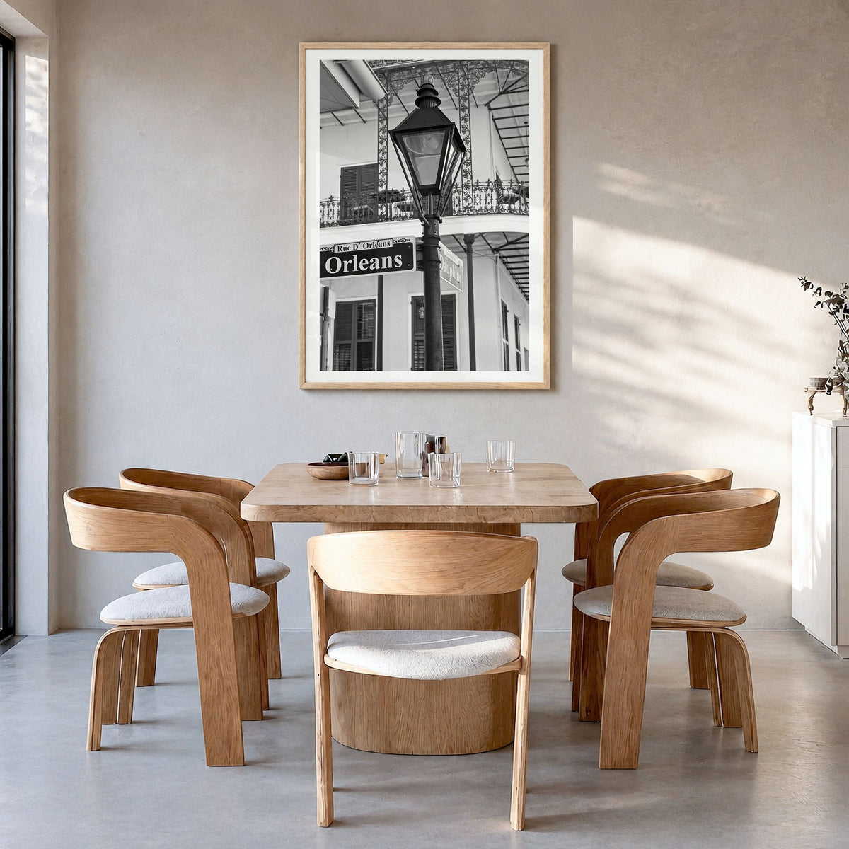 New Orleans Photo No 3 Poster in a natural wood frame, hanging in a dining room, white border