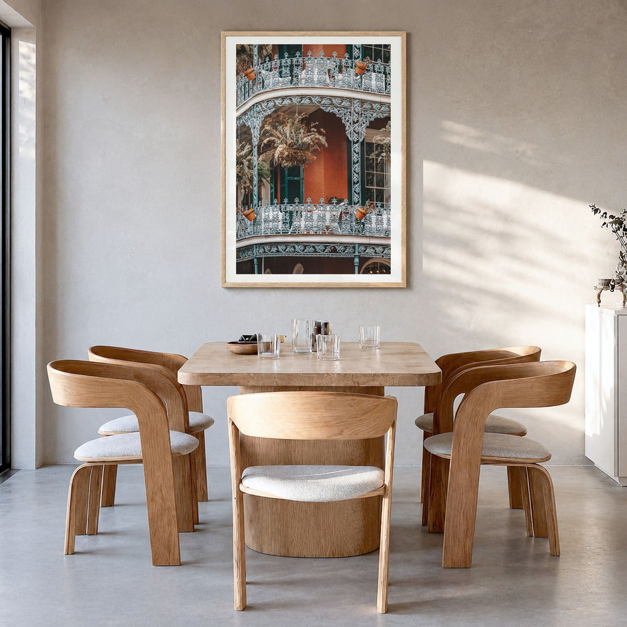 New Orleans Photo No 3 Poster in a natural wood frame, hanging in a dining room, white border