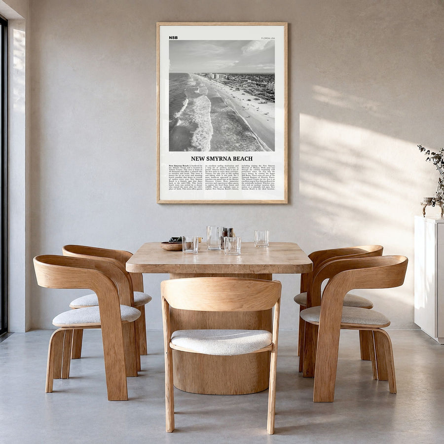 New Smyrna Beach Newspaper Poster in a natural wood frame, hanging in a dining room