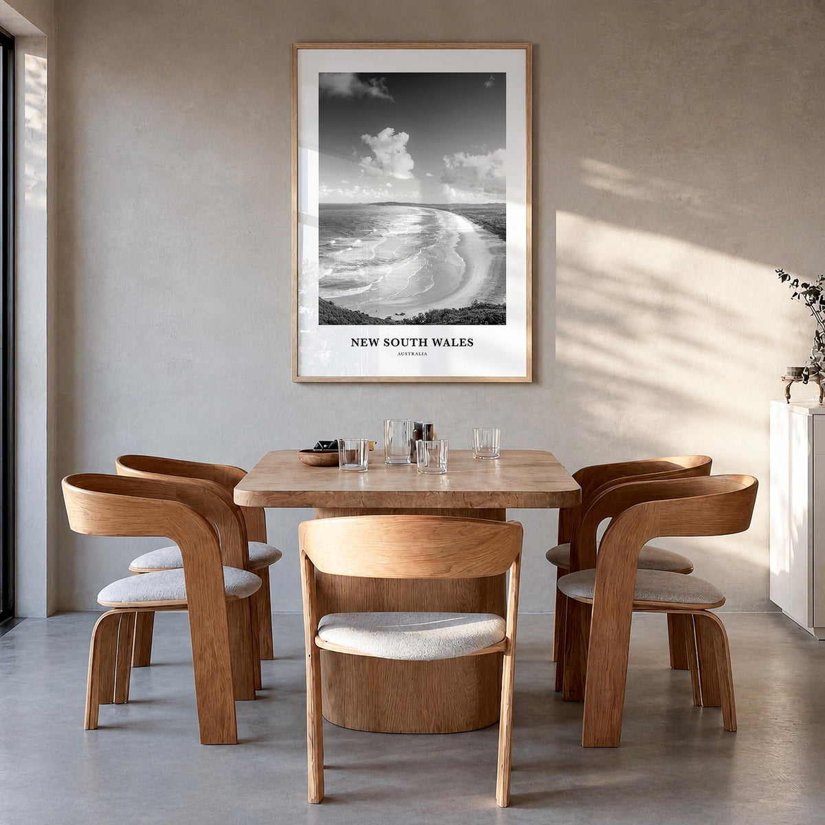 New South Wales black & white classic poster of Australia – vertical wall art in natural wood frame, hanging on wall
