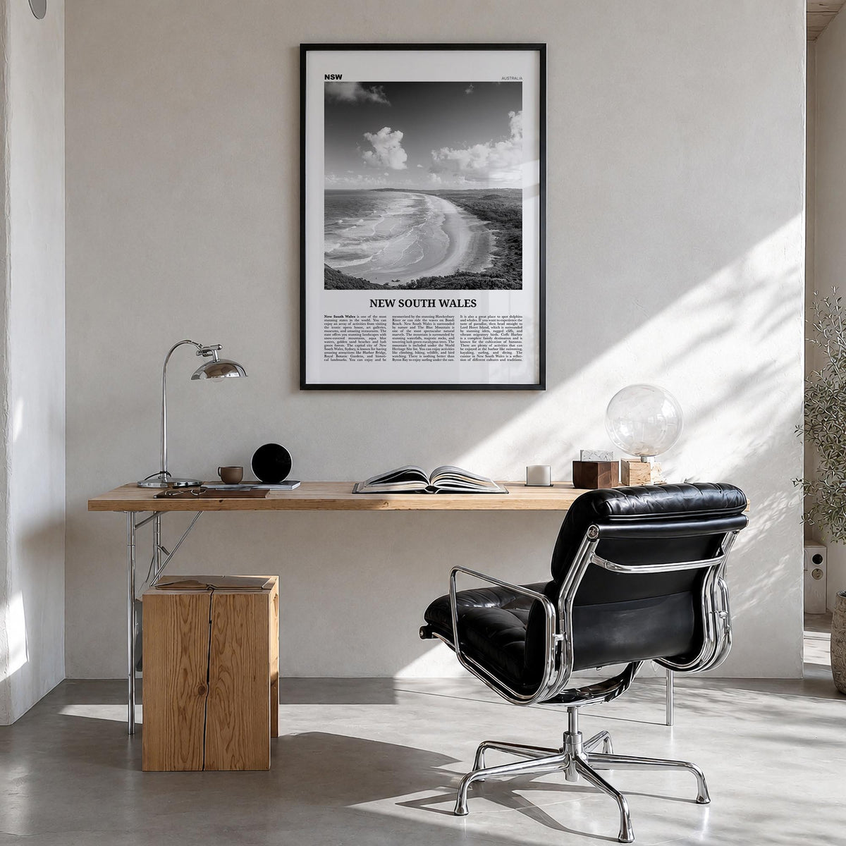 New South Wales black & white newspaper poster of Australia – vertical wall art in black wood frame, hanging on wall