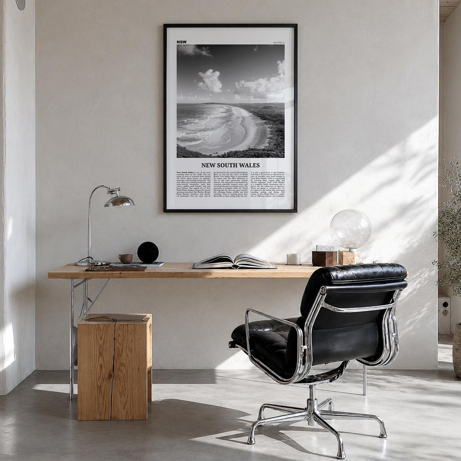 New South Wales black & white newspaper poster of Australia – vertical wall art in black wood frame, hanging on wall