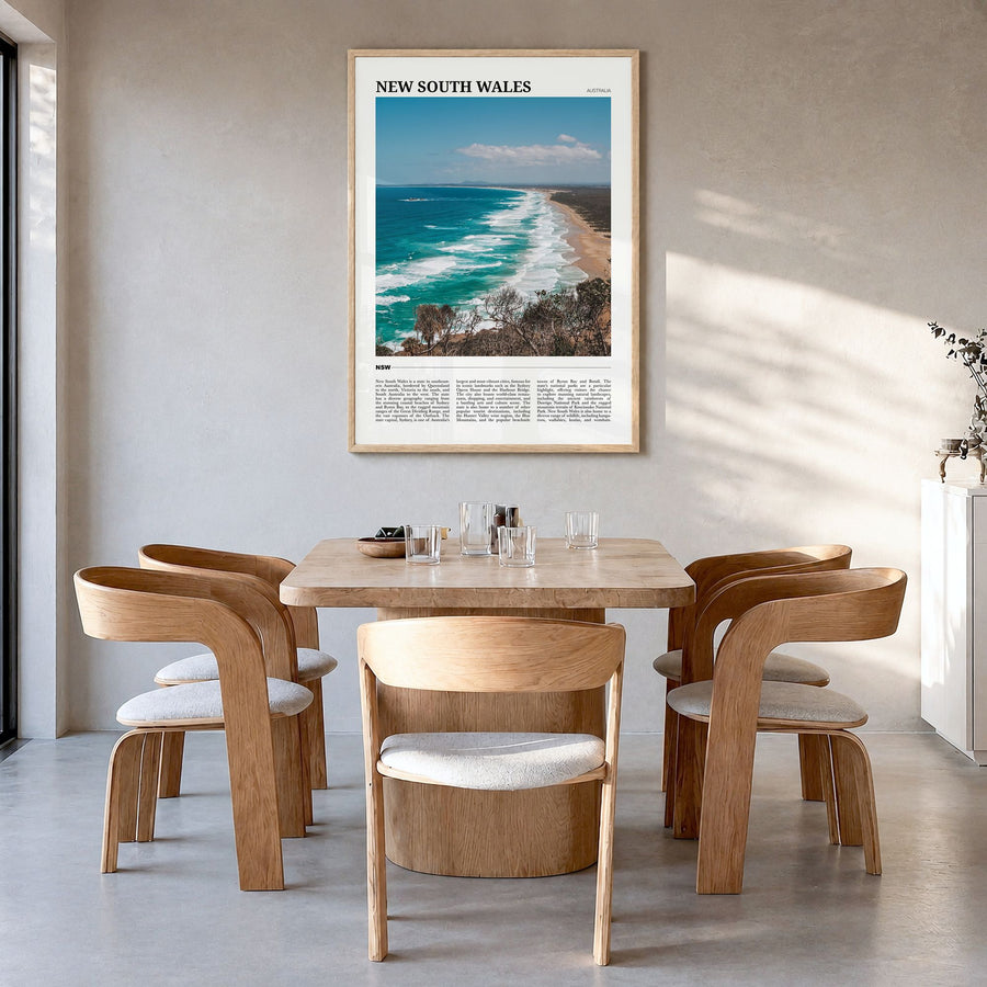 New South Wales Travel No 2 Poster in a natural wood frame, hanging in a dining room