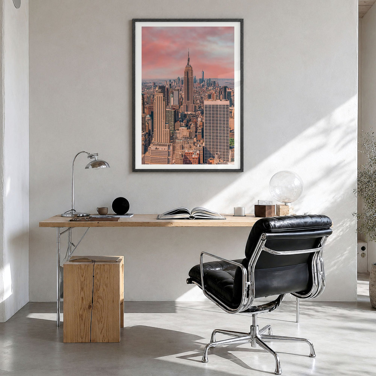 New York City Photo No 1 Poster in a black wood frame, hanging in a bright home office, white border