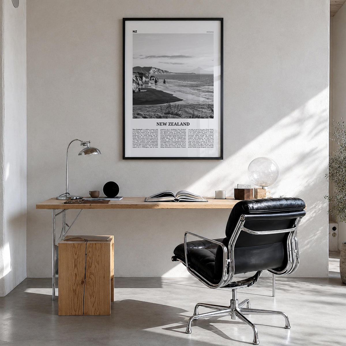 New Zealand no. 2 black & white newspaper poster of Oceania – vertical wall art in black wood frame, hanging on wall