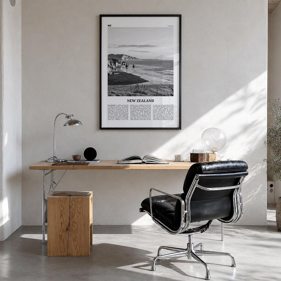 New Zealand no. 2 black & white newspaper poster of Oceania – vertical wall art in black wood frame, hanging on wall