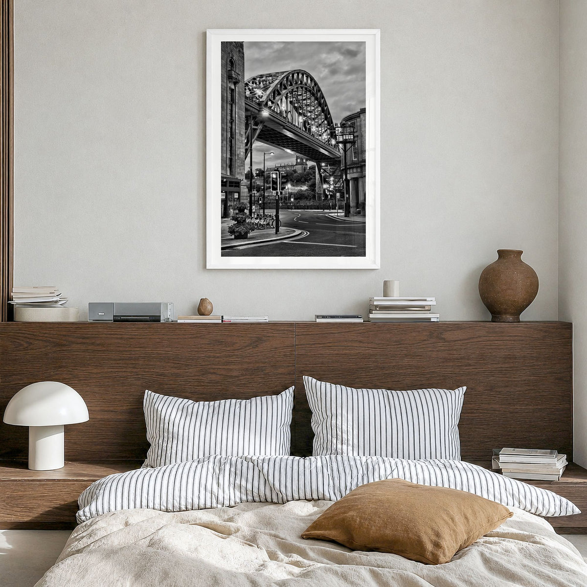 Newcastle upon Tyne Photo Poster in a white wood frame, hanging in a bedroom, white border