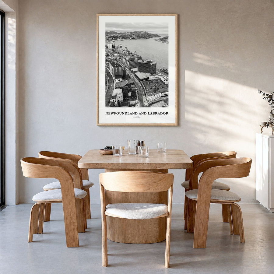 Newfoundland and Labrador Classic Poster in a natural wood frame, hanging in a dining room