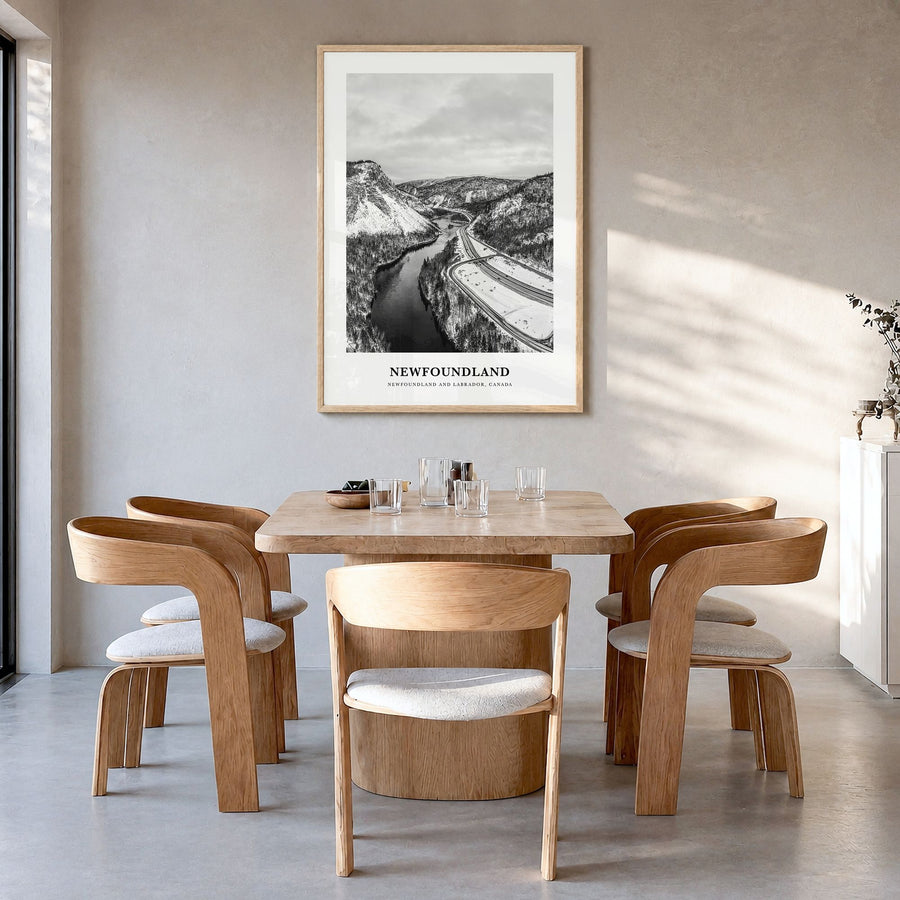 Newfoundland Classic Poster in a natural wood frame, hanging in a dining room