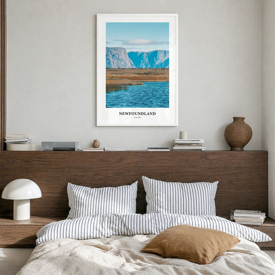 Newfoundland Classic Poster in a white wood frame, hanging in a bedroom