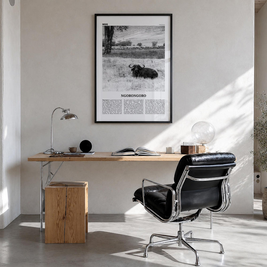 Ngorongoro black & white newspaper poster of Tanzania – vertical wall art in black wood frame, hanging on wall