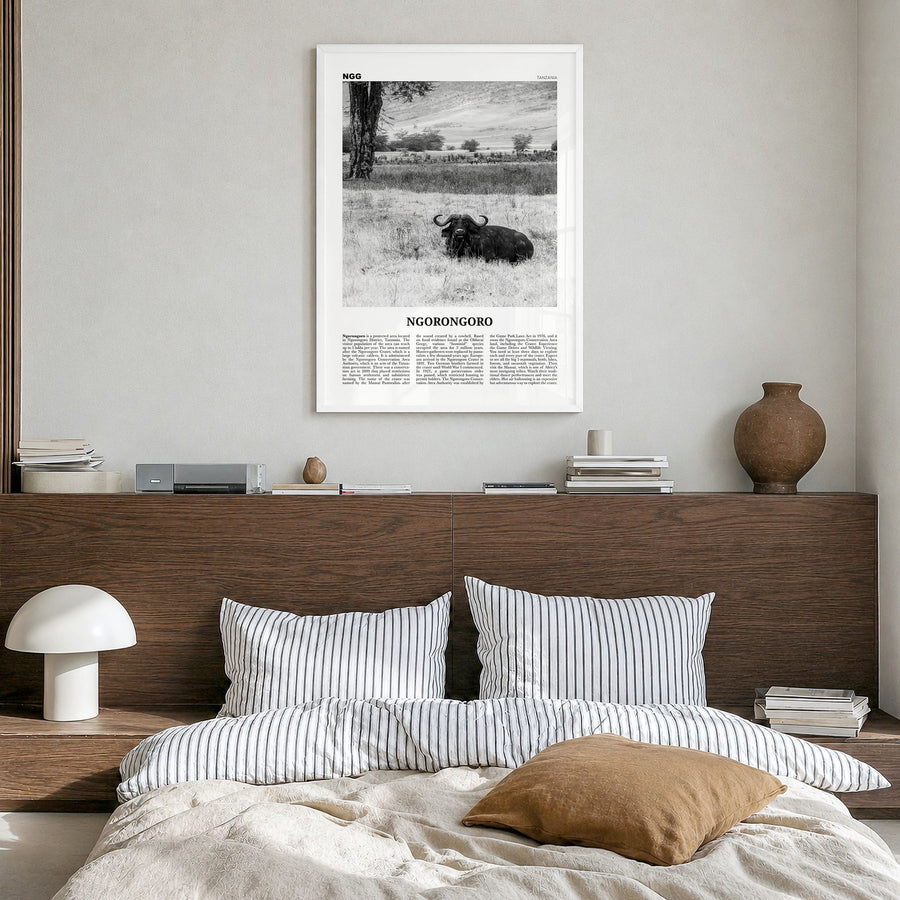 Ngorongoro Newspaper Poster in a white wood frame, hanging in a bedroom