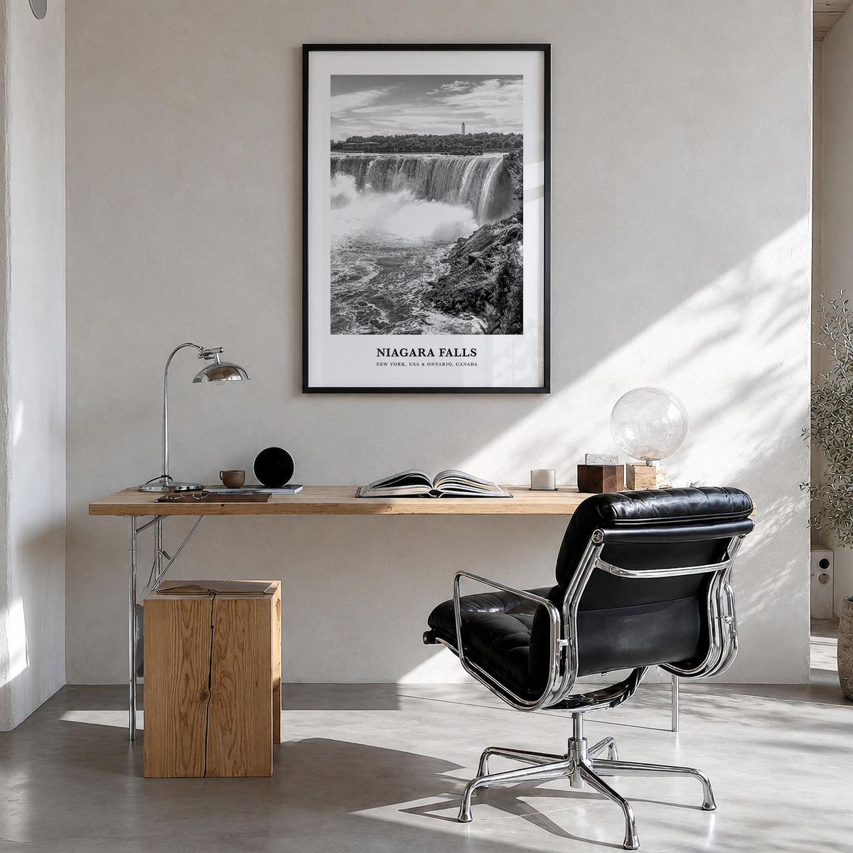 Niagara Falls black & white classic poster of North America – vertical wall art in black wood frame, hanging on wall