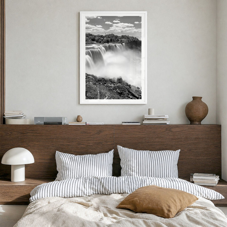 Niagara Falls Photo Poster in a white wood frame, hanging in a bedroom, white border