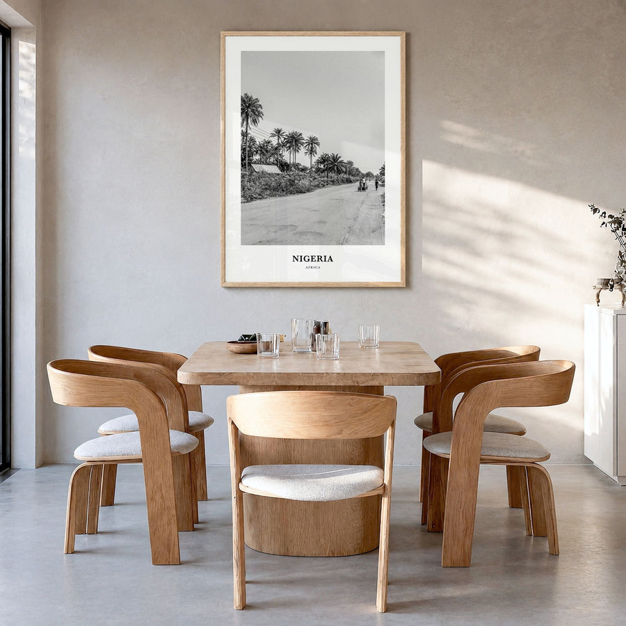 Nigeria Classic No 2 Poster in a natural wood frame, hanging in a dining room