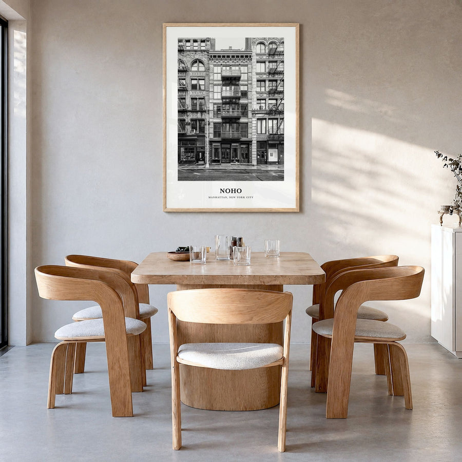 NoHo Classic Poster in a natural wood frame, hanging in a dining room