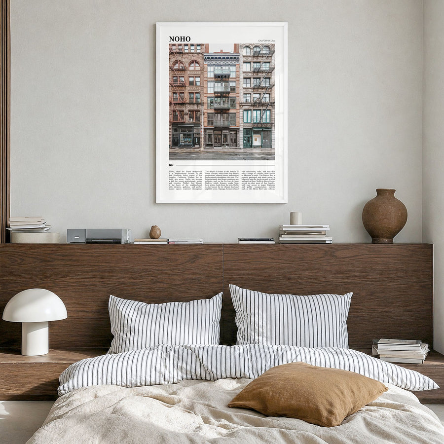Noho Travel Poster in a white wood frame, hanging in a bedroom