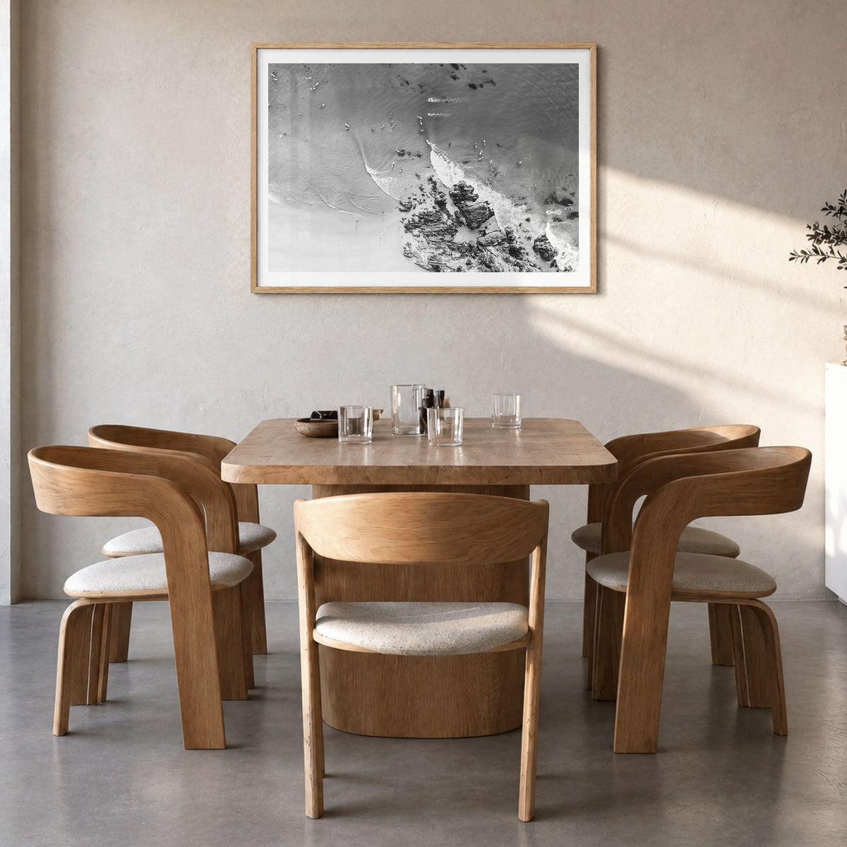 Noosa Heads Photo Poster in a natural wood frame, hanging in a dining room, white border