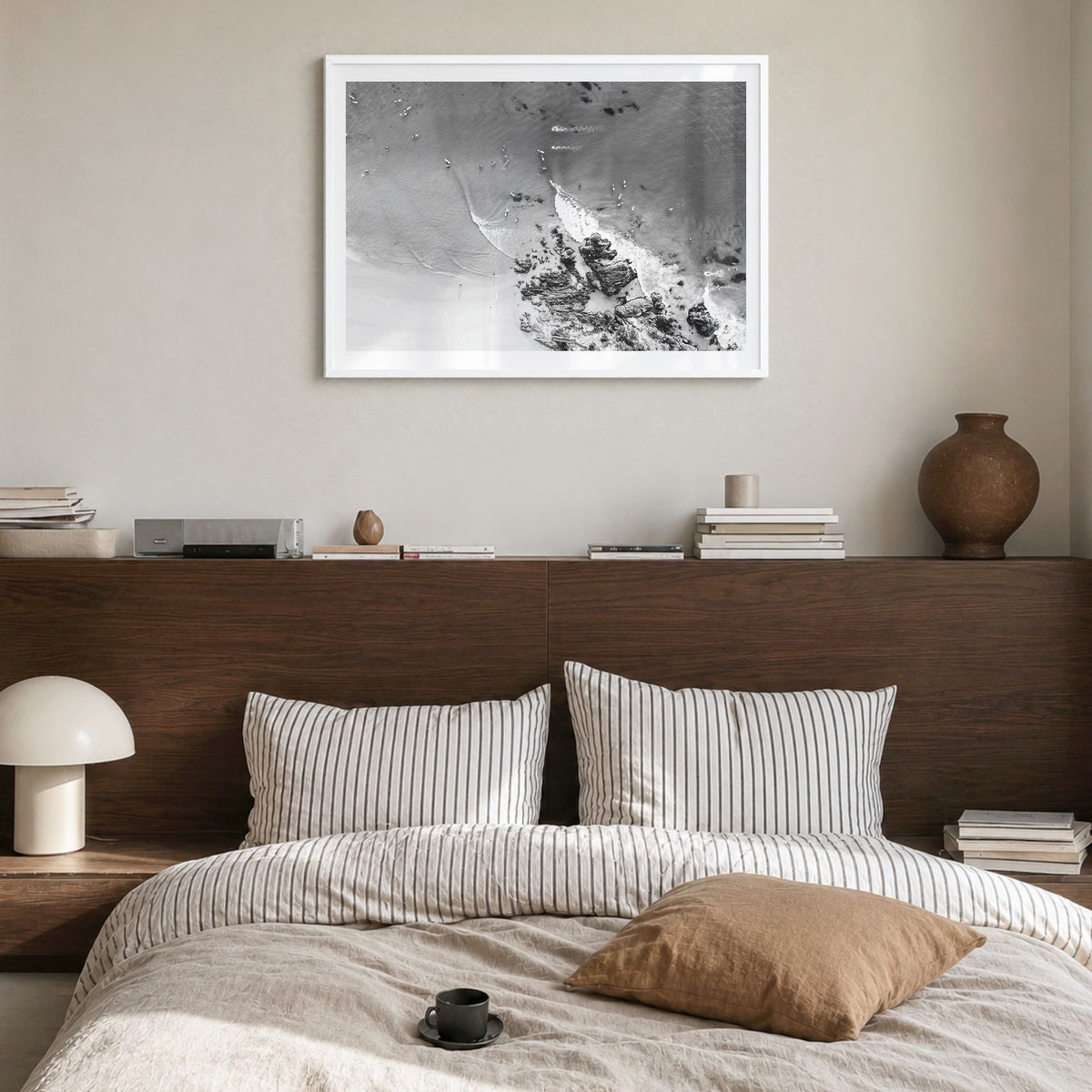 Noosa Heads Photo Poster in a white wood frame, hanging in a bedroom, white border