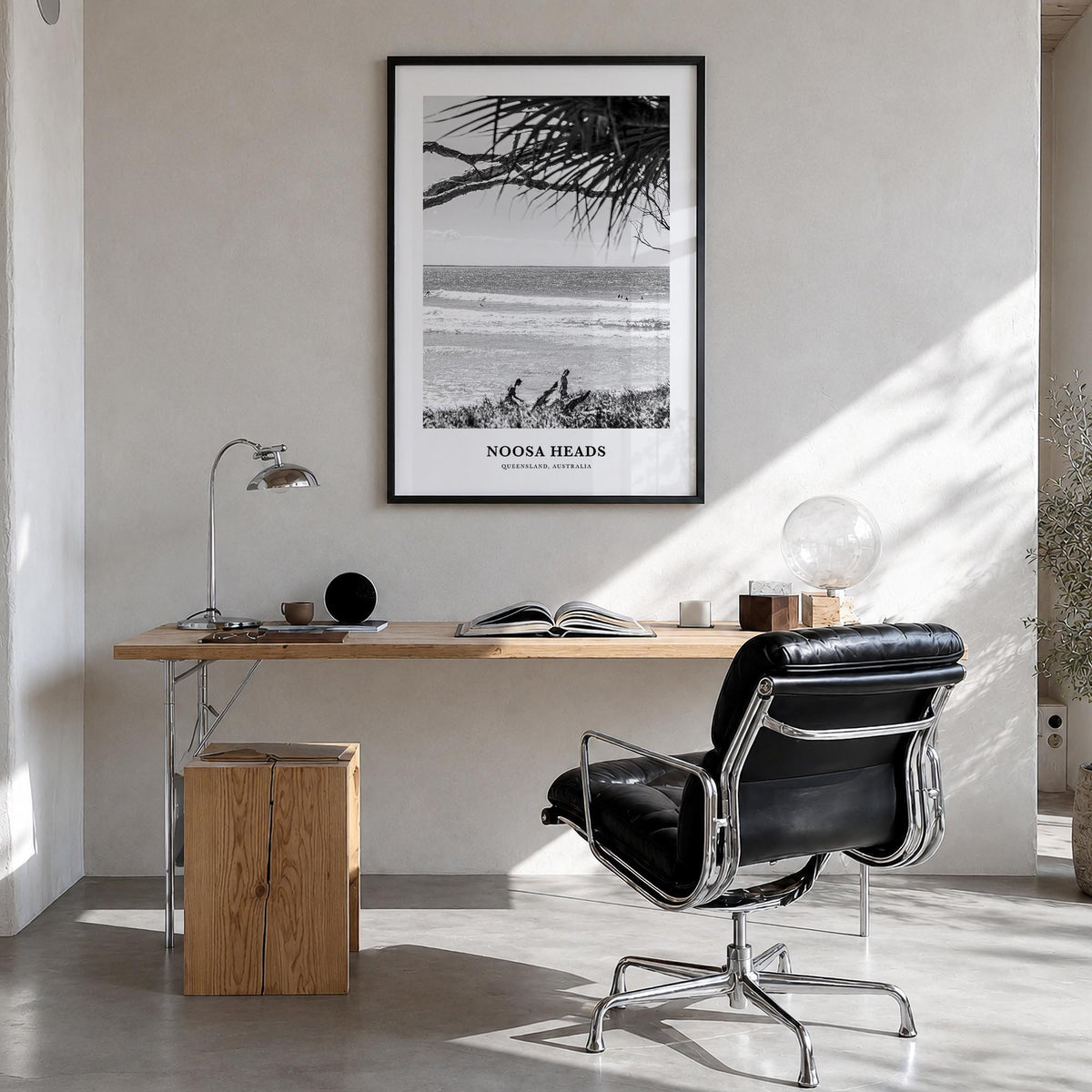 Noosa Heads no. 2 black & white classic poster of Queensland, Australia – vertical wall art in black wood frame, hanging on w