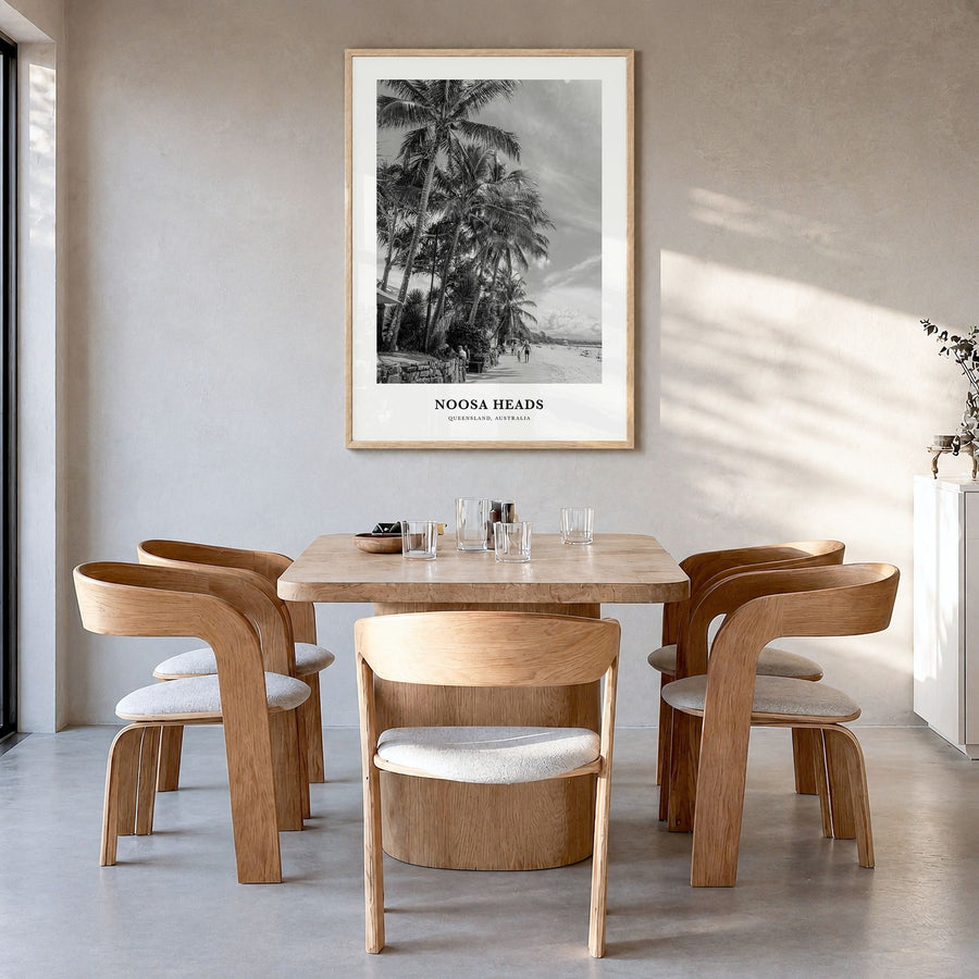 Noosa Heads Classic No 1 Poster in a natural wood frame, hanging in a dining room