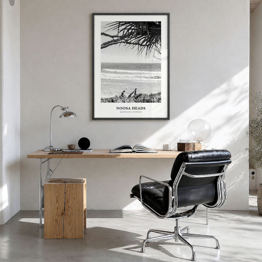 Noosa Heads Classic No 2 Poster in a black wood frame, hanging in a bright home office